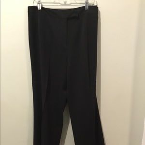 Women’s black dress pants.